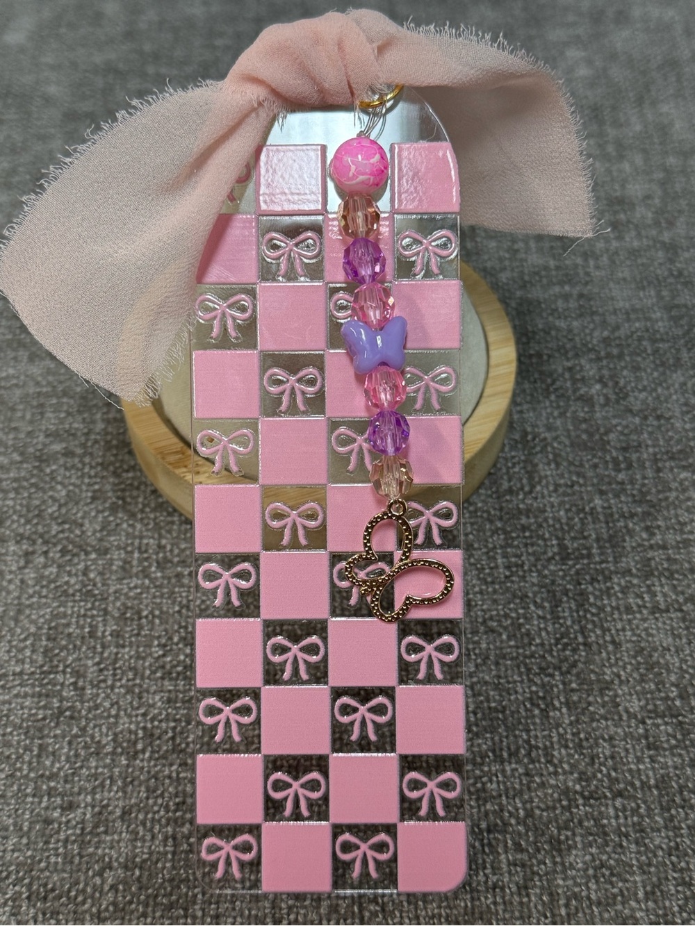 Acrylic bookmark “bows” design, beads and butterfly Charm. NWOT